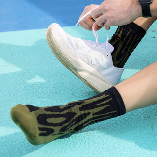 Marathon Crew Sock: Drippy Cheetah Green